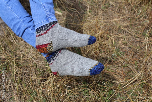A person's feet in a pair of socks