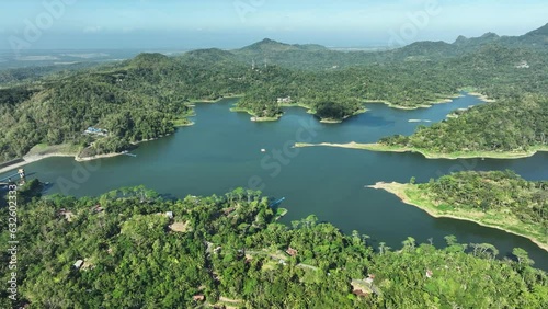 Aerial View of Waduk Sermo Artificial Lake from Kalibiru National Park, Indonesia. photo