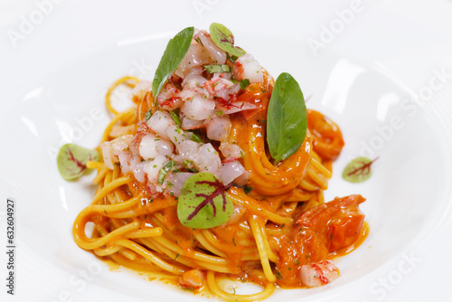 Italian food speciality, spaghetti seafood sauce with red prawns( gambero rosso) tartare