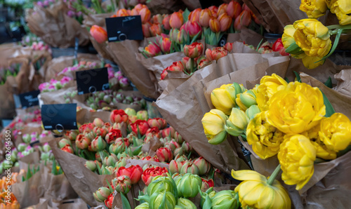 tulip market stall, flower bouquets in metal buckets