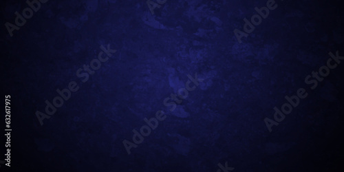 Dark Blue background with grunge backdrop texture, watercolor painted mottled blue backdrop background. concrete wall blue bright ink and watercolor textures on black paper background.