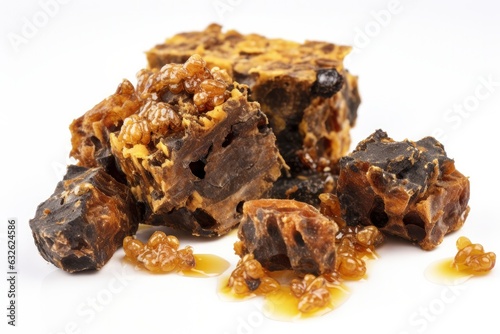 Nutritious natural propolis on a white background.