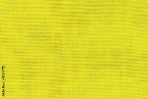 Yellow color linen texture, yellow canvas texture as background 