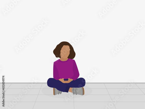 Girl sitting cross-legged on the floor