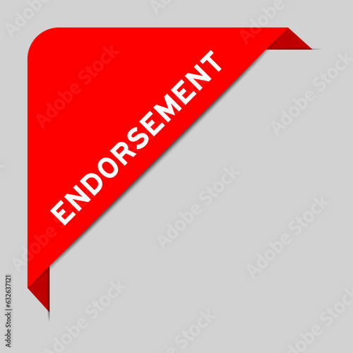 Red color of corner label banner with word endorsement on gray background