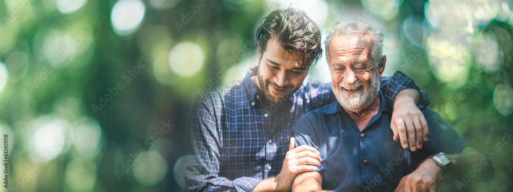 © chokniti - Adult hipster son and old senior father stay at home garden, two generations have a beard talking together and relaxing with smile, happy enjoy living fun in father's day, Hugs and shoulders with love