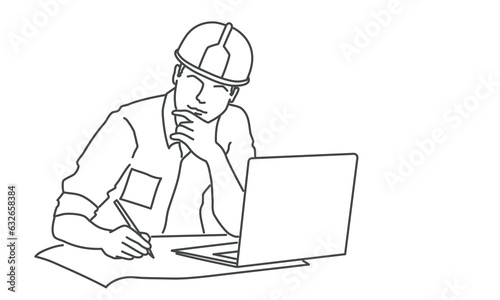 Engineer in a helmet working on a project.
