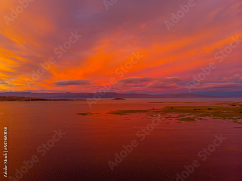 el calafate  atardecer  patagonia  argentina  cielo  sol  nube  paisaje  lago  anaranjada  anochecer  horizonte  luz solar  rojo  color  dji