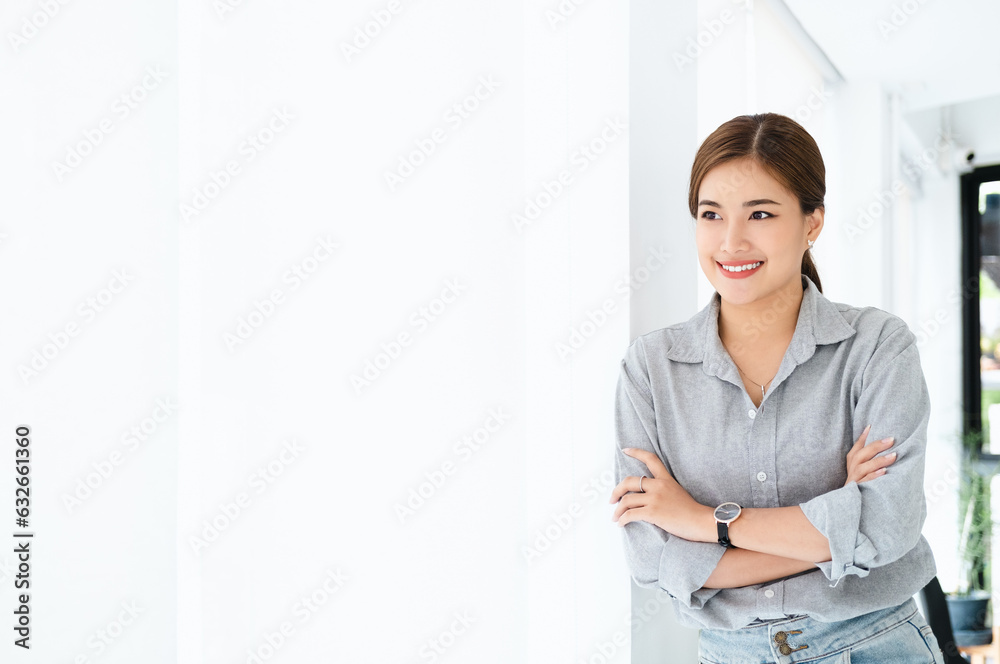 young asian business woman smiling confident with arms crossed gesture at office young asian business woman smiling confident with arms crossed gesture at office