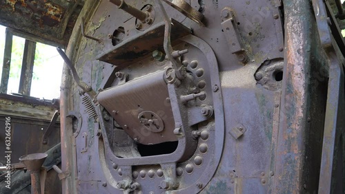 Old locomotive from Beirut–Damascus covered by plants Beqaa Rayak Lebanon photo