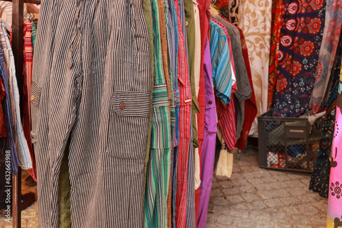 Multicolored clothes and fabrics in an arabic market