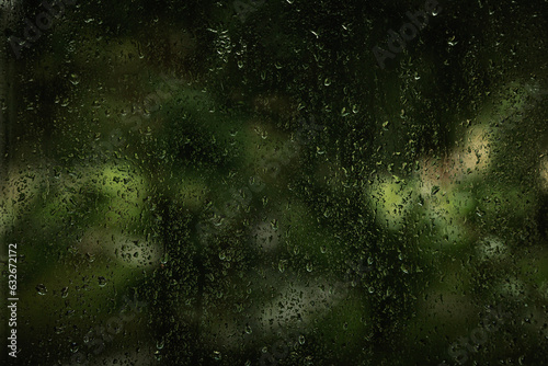 Rain drops on window on the rainy day