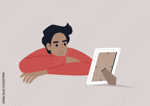 A youthful character reflecting on a photograph in a white frame, lost in a nostalgic reverie