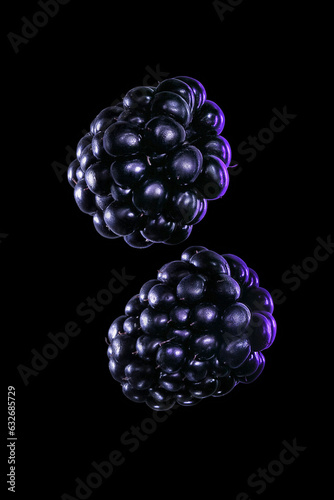 The pair of blackberries on black. Macroshot