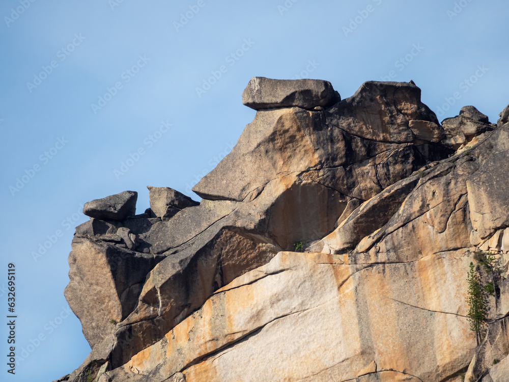 Crumbling rock. Abstract crumbling cliff rock formation. Eroding rock cliffs.