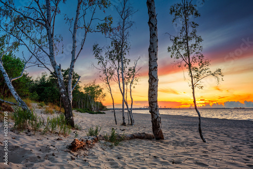 Fototapeta Naklejka Na Ścianę i Meble -  Amazing sunset on the beach at Baltic Sea in Gdansk, Poland