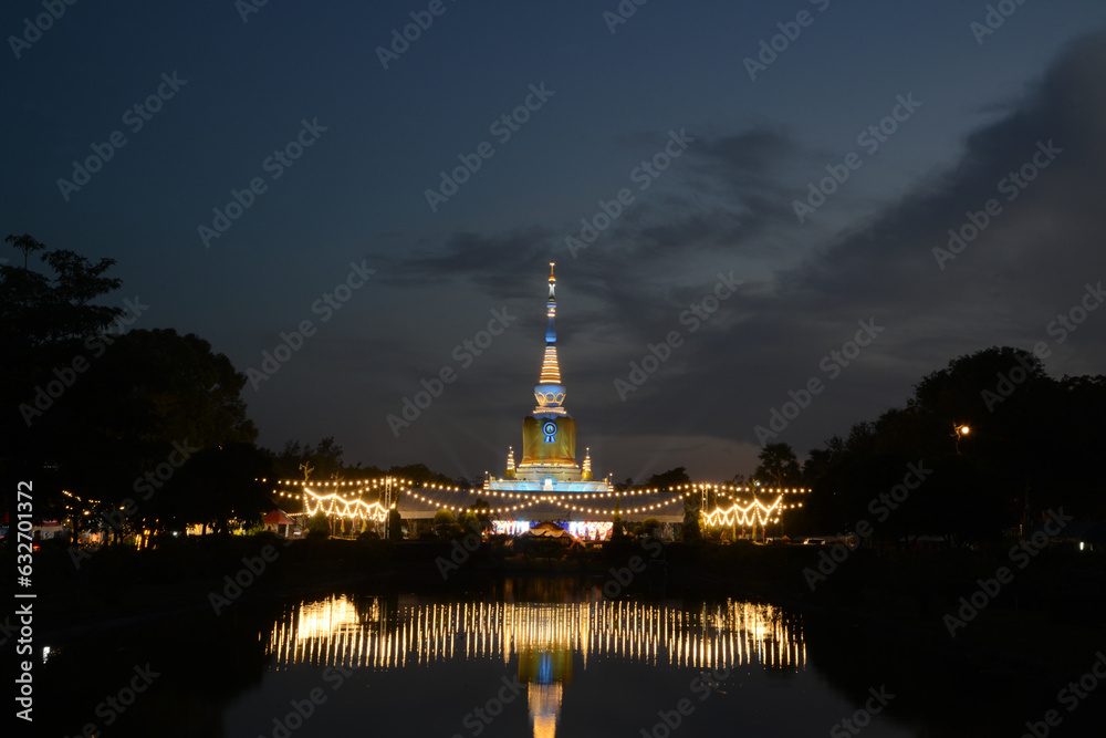 Night time of the pagoda is Phra That Na Dun a sacred place built for the prosperity of the region. It is the center of Buddhism and arts and culture. Located at Maha Sarakham Province in Thailand. Night time of the pagoda is Phra That Na Dun a sacred place built for the prosperity of the region. It is the center of Buddhism and arts and culture. Located at Maha Sarakham Province in Thailand.