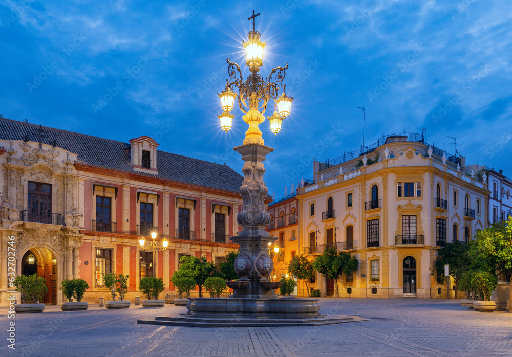 View of the Virgen de los Reyes square in Seville at sunrise.