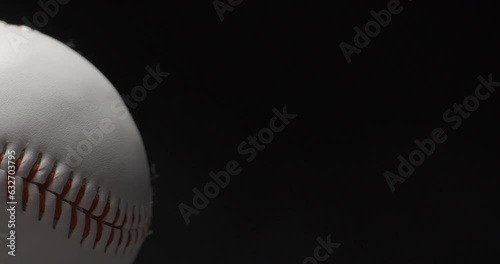 Baseball ball close up rotating in studio
