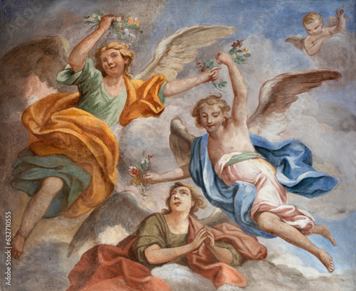 GENOVA, ITALY - MARCH 6, 2023: The fresco angels with the flowers in church B...