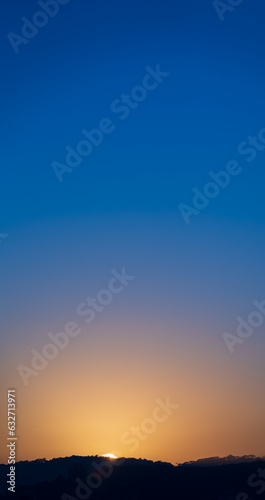 Breath-taking View of Sunrise over Mountain Range with Spacious Sky