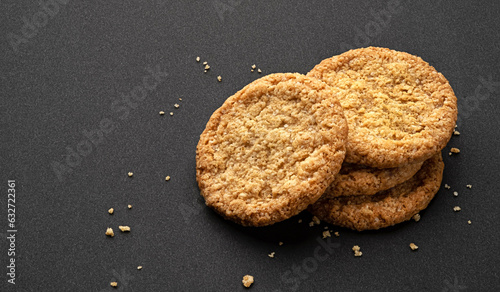 Oatmeal cookies on black background, full depth of field