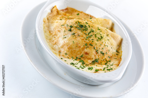 roasted crepes with sauce and cheese