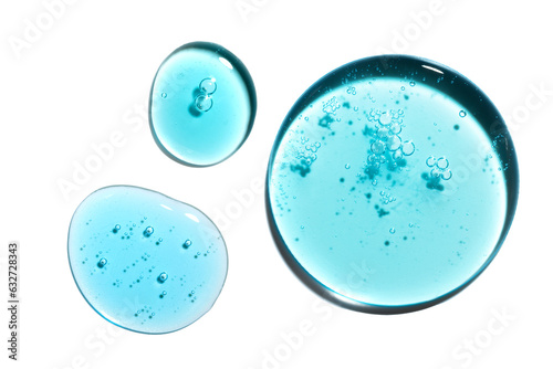Texture swatch of blue hyaluronic acid serum gel on white isolated background, macro. Detergent, cosmetics, laboratory. A round drop in a petri dish photo