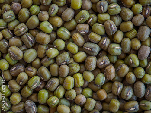 Pile of dried green organic mungo beans. Overhead shot. photo