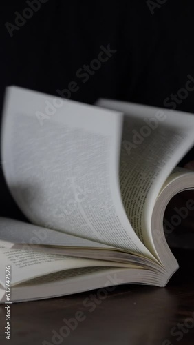 Open book on black background