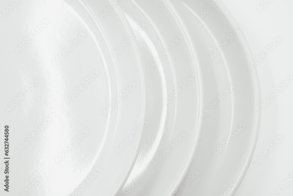 Obraz premium White round plate on white background copy space