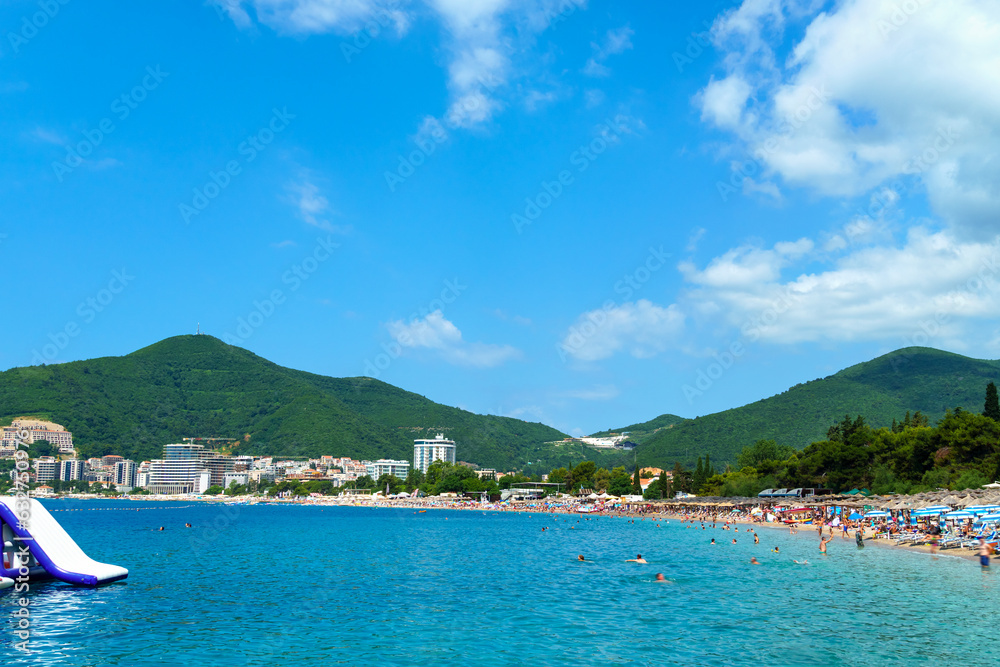 beautiful view of the seaside resort town and beaches, mountains, panorama of Budva in Montenegro, Adriatic Sea, tourism and summer travel