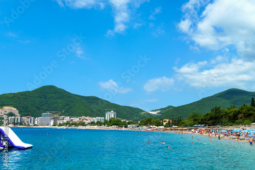 beautiful view of the seaside resort town and beaches, mountains, panorama of Budva in Montenegro, Adriatic Sea, tourism and summer travel