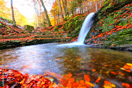 scenic waterfall in Carpathian mountains, Ukraine, Europe, awesome autumn landscape