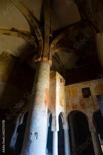 Interior of Hermitage of San Baudelio de Berlanga at Caltojar with remains of antique frescoes on walls and columns, Spain.. photo