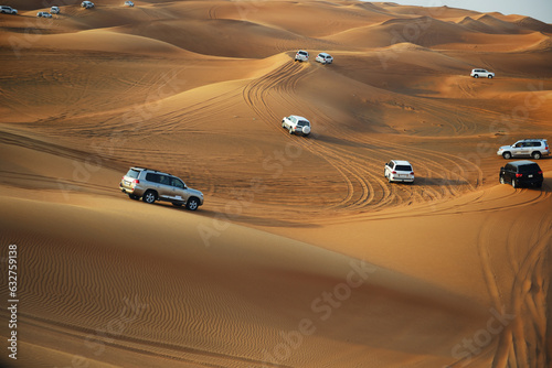 The Dubai desert trip in off-road car is major tourists attraction in Dubai, UAE