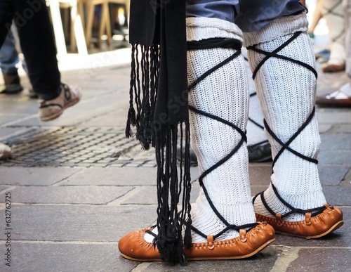 Close up of a man wearing abarcas, albarcas or abarkas vascas, traditional basque footwear  photo