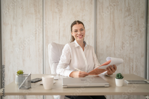 One woman caucasian female businesswoman work at her office desk