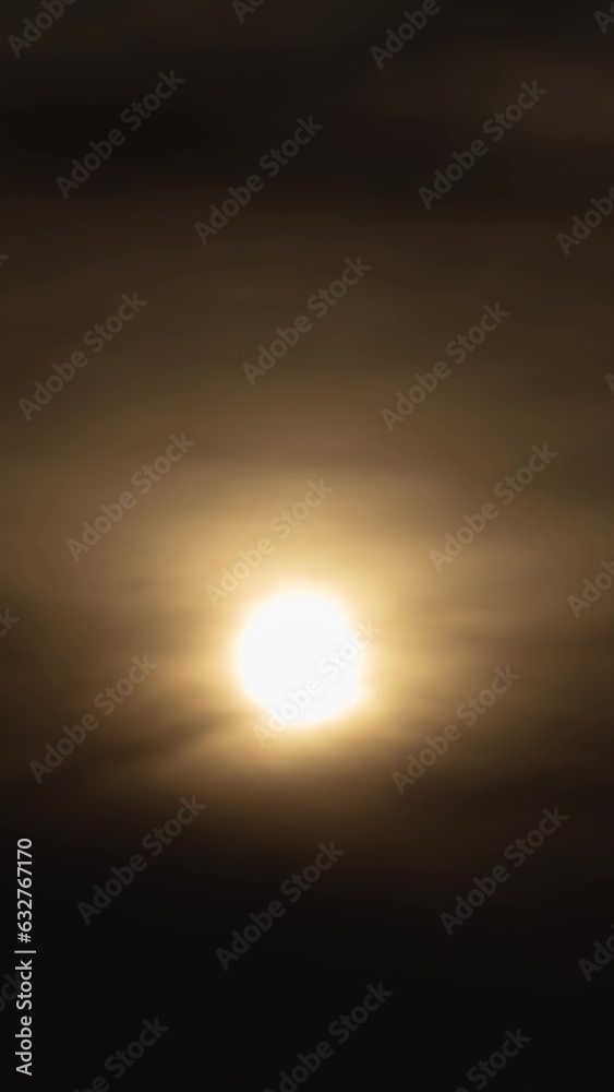 Full moon breaking through the clouds at night. Timelapse. Full moon breaking through the clouds at night. Timelapse.