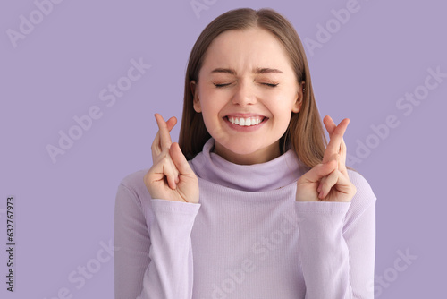Young woman in sweater cros...
