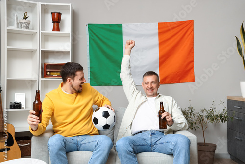 Irish men with beer and bal...