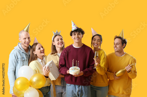 Group of young friends cele...