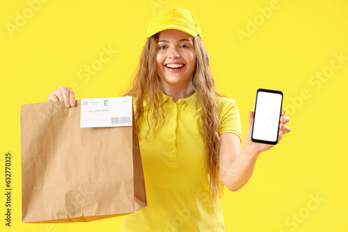 Female courier with paper b...
