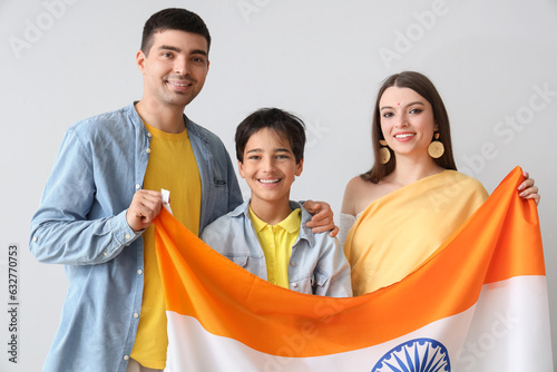 Happy family with Indian fl...