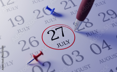 July 27th.  Calendar date. close up a red circle is drawn on July 27st to remember important events