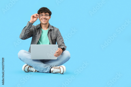 Male programmer working wit...