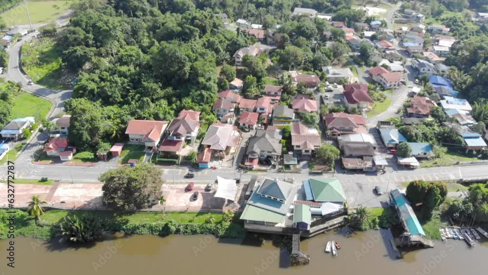 Aerial View of modern houses surrounded by greenery in Kampung village Aerial View of modern houses surrounded by greenery in Kampung village