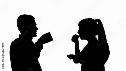 Silhouette of couple man and woman drinking drinks. black and white mask photo