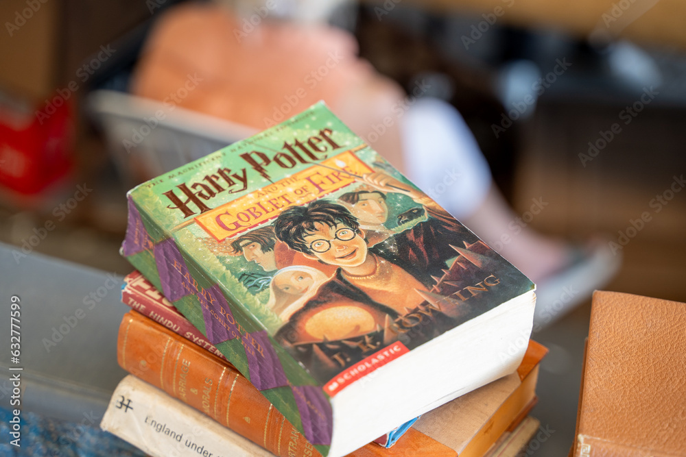 Fototapeta premium Harry Potter and the Goblet of Fire book by J.K. Rowling at the flea market. Ankara, Turkey - August 6, 2023.