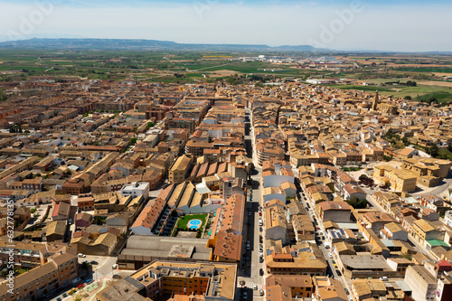 General aerial view of Spanish town of Ejea de los Caballeros in province of Zaragoza on sunny spring day.. photo